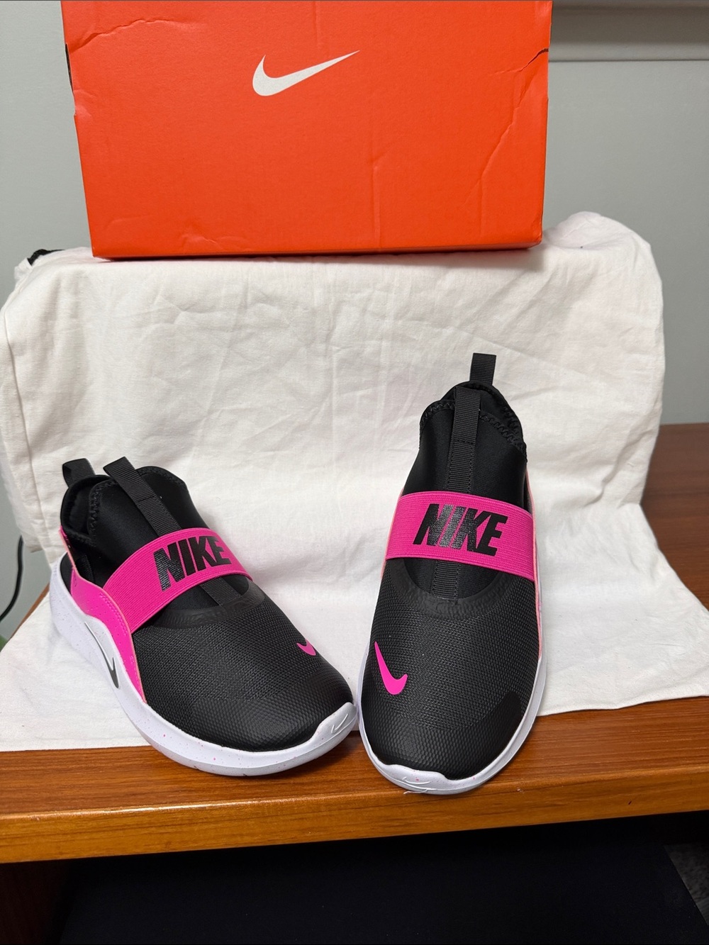 Nike Women's Black Sneakers with Hot Pink Strap